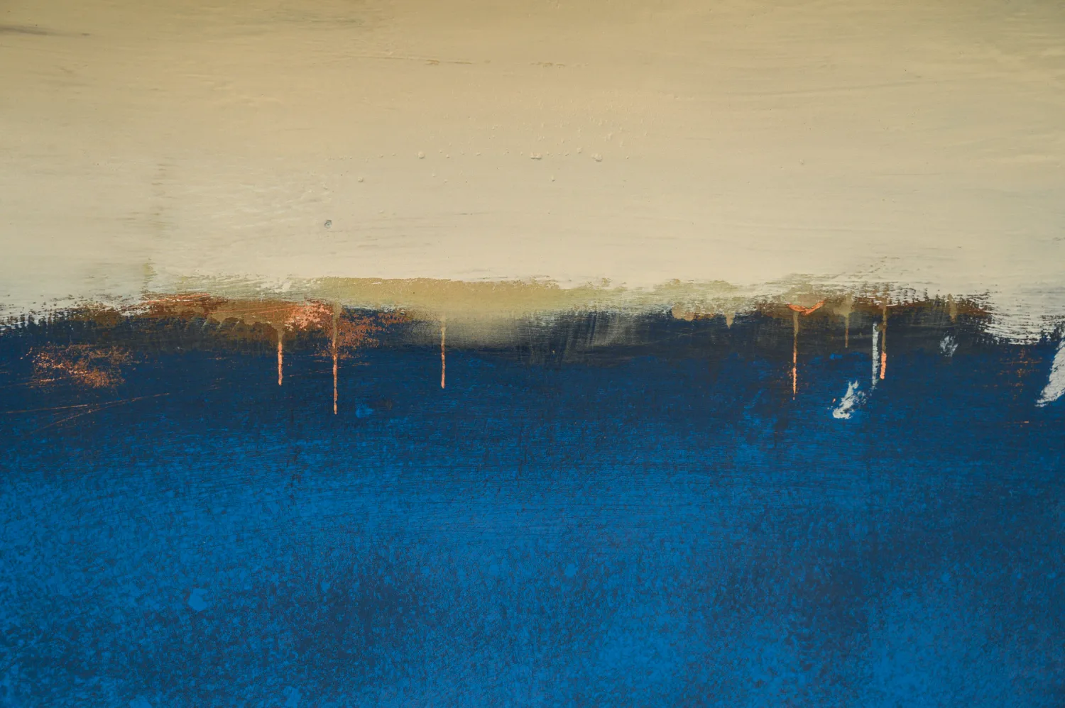 Abstract detail of a hull: cream and deep blue paint layers with copper drips — commercial and editorial photography by Janina Laszlo, photographer in Munich