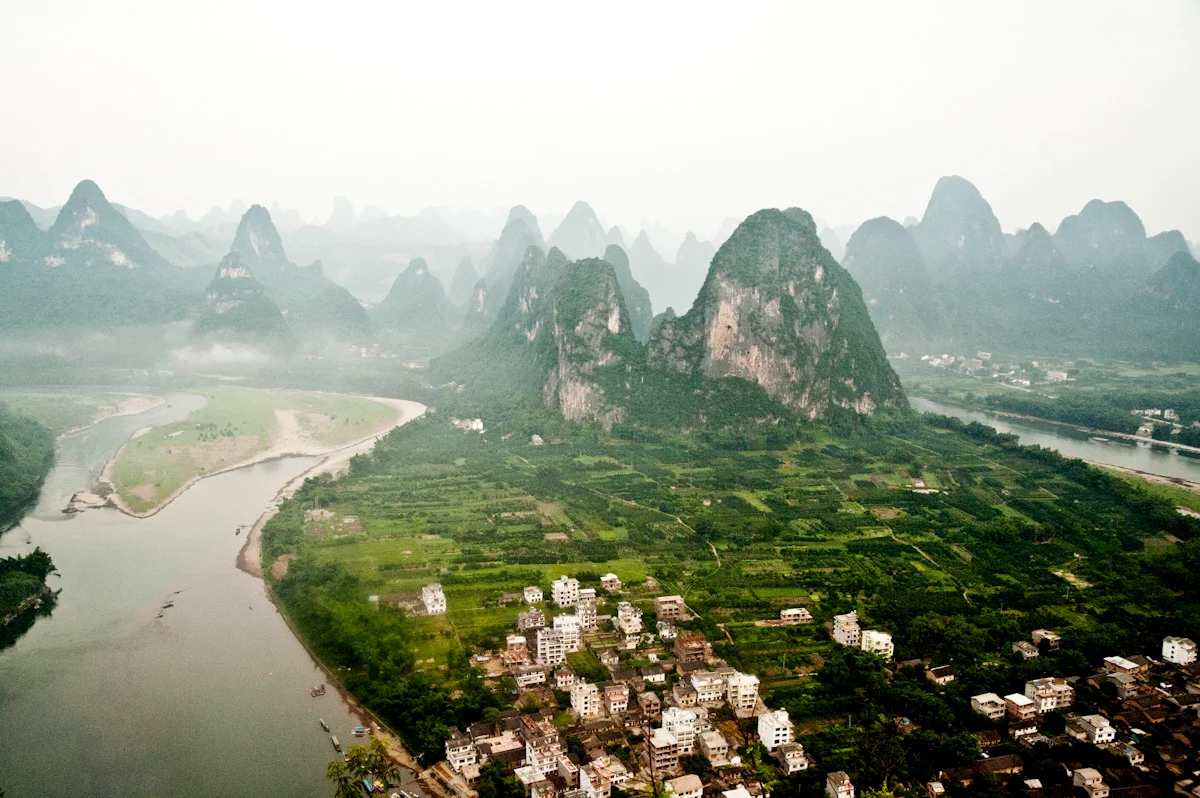 Karst peaks above the Li River and the village of Xingping, Guangxi — China, documentary and travel photography by Janina Laszlo
