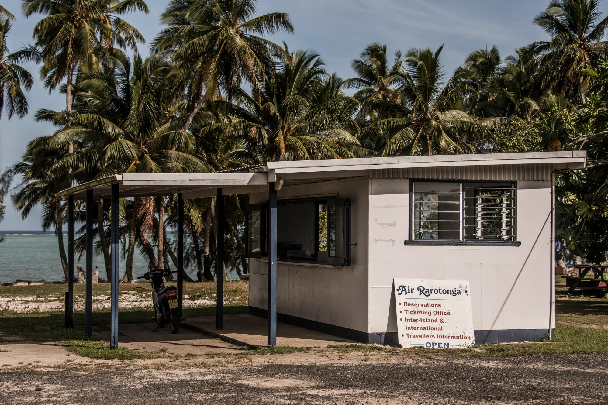 Air Rarotonga office under coconut palms by the lagoon — Cook Islands, travel and fine art photography by Janina Laszlo