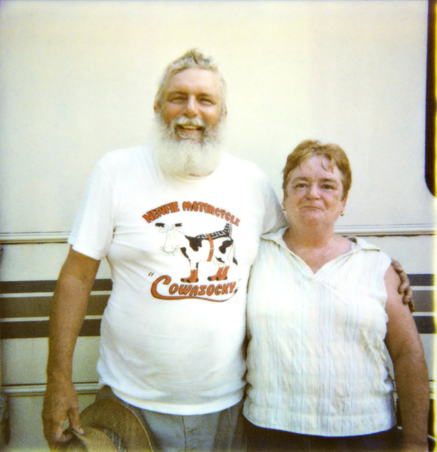 Bearded man and his wife in front of their RV — Expired Polaroids in Florida, fine art and analog photography by Janina Laszlo