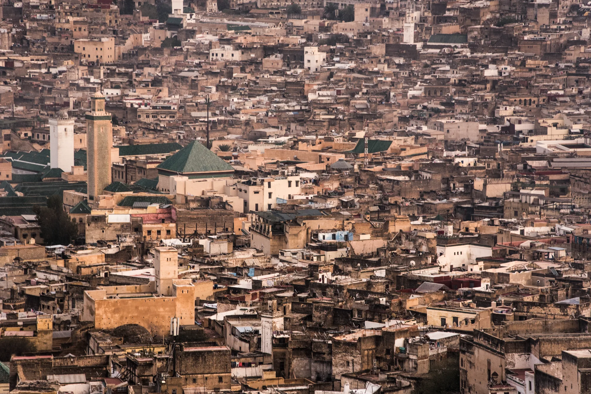 View over the roofs of Fez el-Bali with green-tiled roofs and minarets, Fez — Fez, street and travel photography by Janina Laszlo