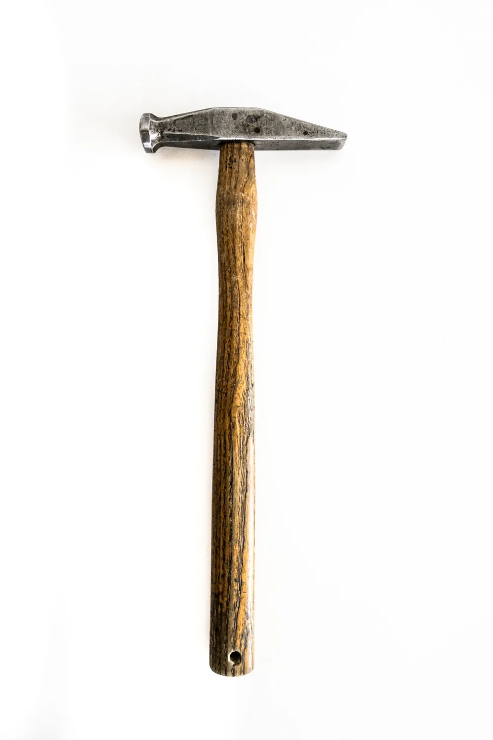 Goldsmith's hammer on a white background — goldsmith Gerd Weickmann — reportage by Janina Laszlo, photographer in Munich