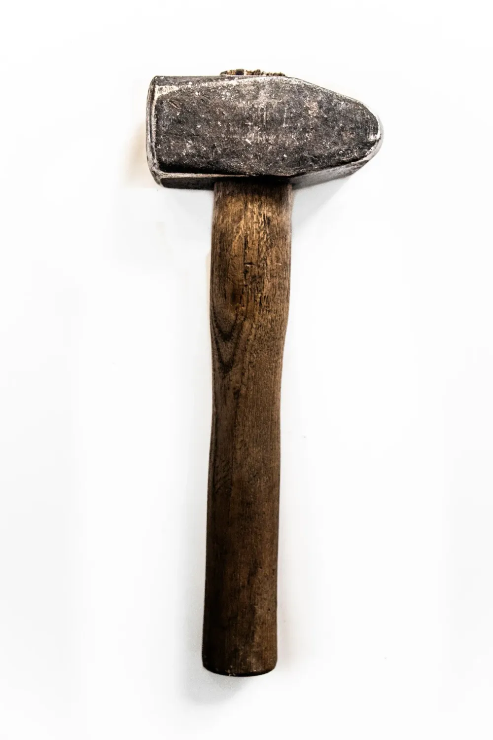 Old forging hammer on a white background — knife smith Alfons Bolley — reportage by Janina Laszlo, photographer in Munich