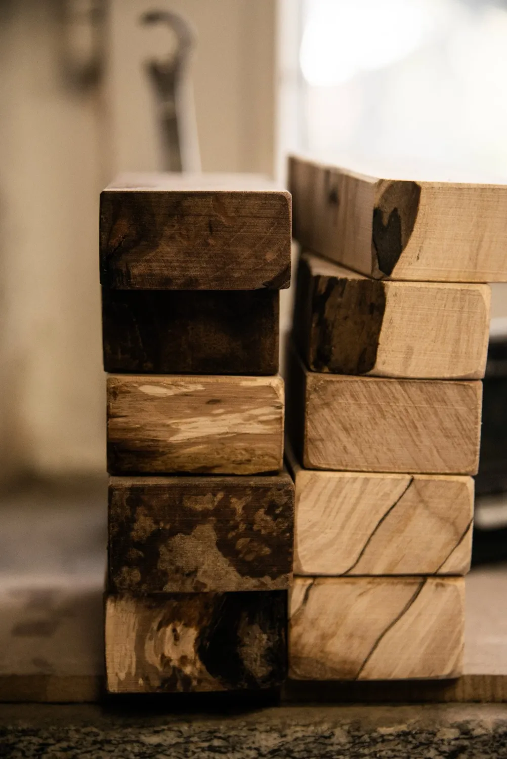 Stacked wooden blocks for knife handles — knife smith Alfons Bolley — reportage by Janina Laszlo, photographer in Munich