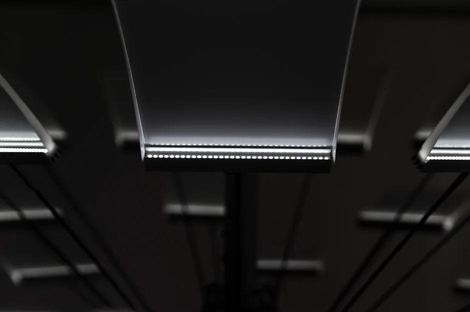 LED strip on the edge of an LC 1.0 chandelier panel, dark detail — LC 1.0 chandelier by Denise M. Hachinger, product and design photography by Janina Laszlo