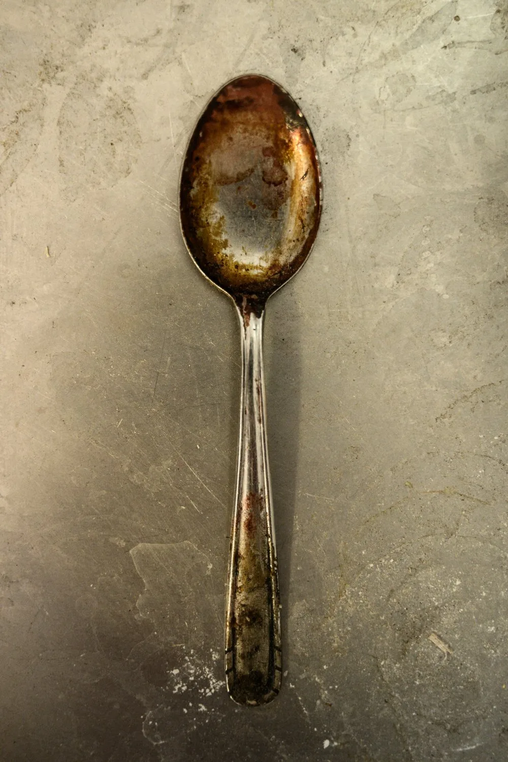 Old worn spoon used in varnish preparation — Martin Schleske, master violin maker, editorial portrait and documentary photography by Janina Laszlo, Landsberg am Lech