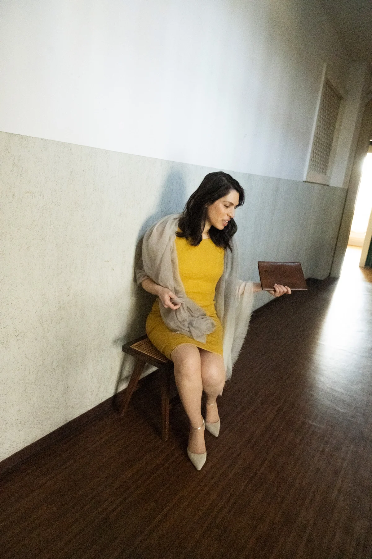 Na’ama Goldman in a yellow dress seated on the floor — Na’ama Goldman, mezzo-soprano, opera portrait photography by Janina Laszlo