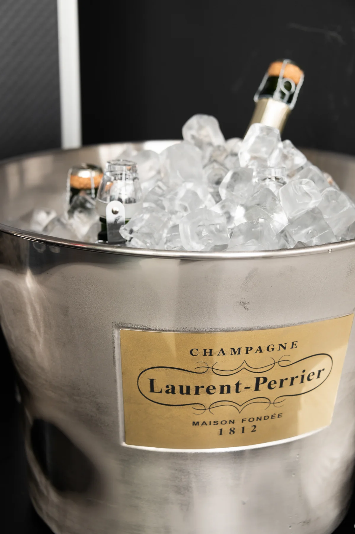 Champagne bottle in an ice bucket — Salon Rouge, Michelin pop-up restaurant by Tohru Nakamura, Munich, for Der Feinschmecker — food and portrait photography by Janina Laszlo