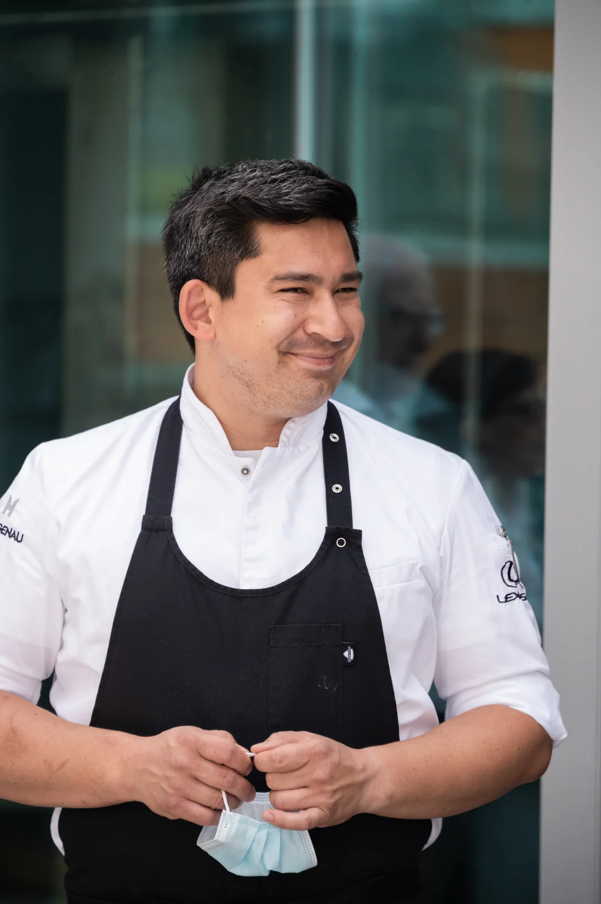 Chef Tohru Nakamura in his white chef’s jacket and apron — Salon Rouge, Michelin pop-up restaurant by Tohru Nakamura, Munich, for Der Feinschmecker — food and portrait photography by Janina Laszlo