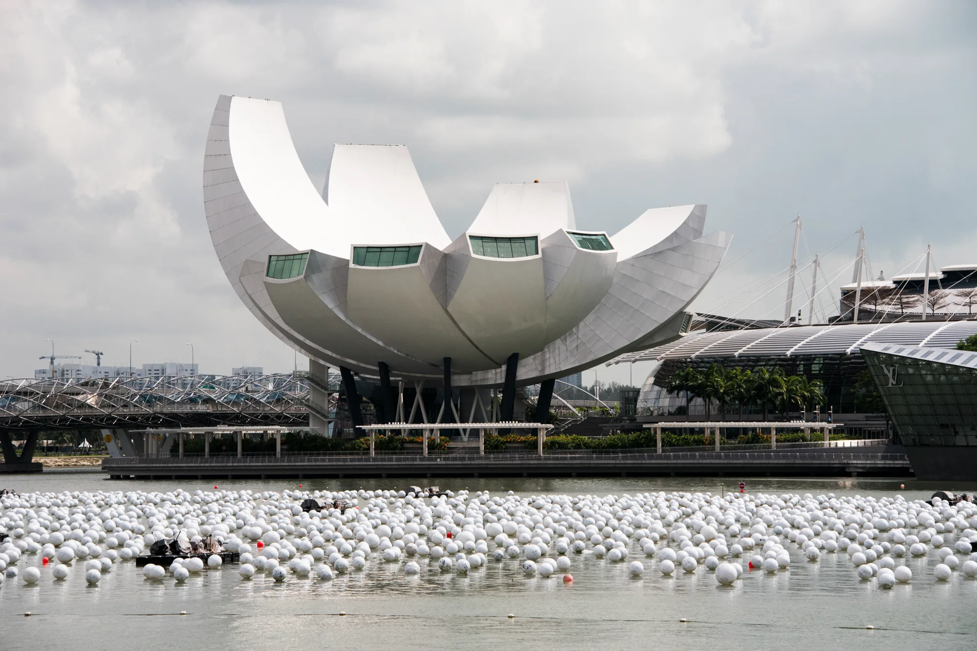 ArtScience Museum with floating white spheres on Marina Bay and the Helix Bridge — Singapore, architecture and travel photography by Janina Laszlo