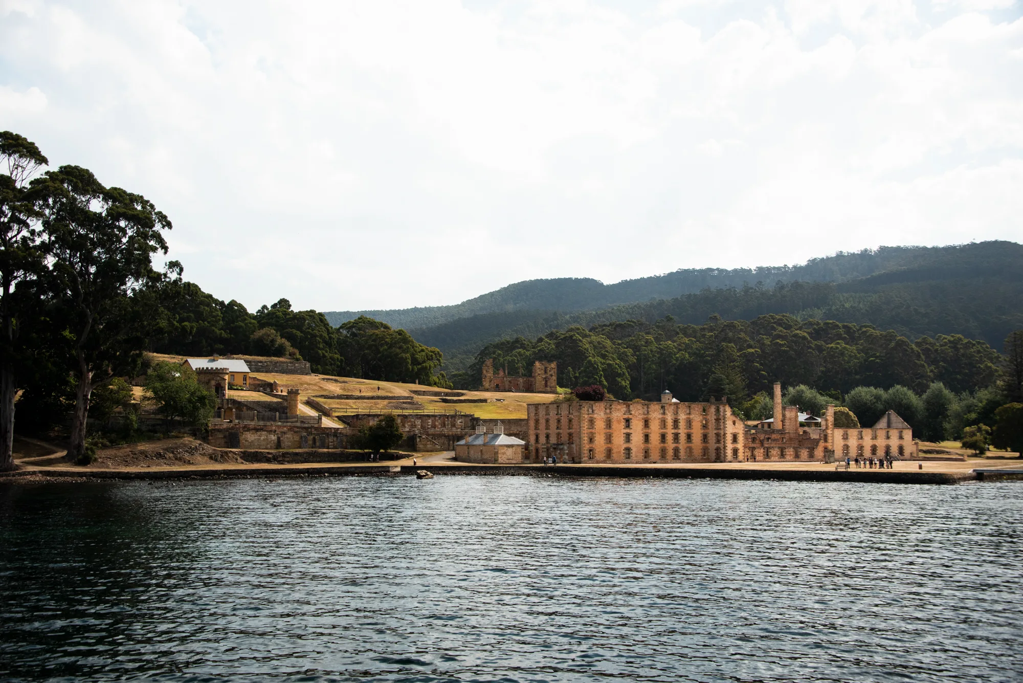 Ruins of the Penitentiary at Port Arthur Historic Site seen from the water — Tasmania, landscape and travel photography by Janina Laszlo