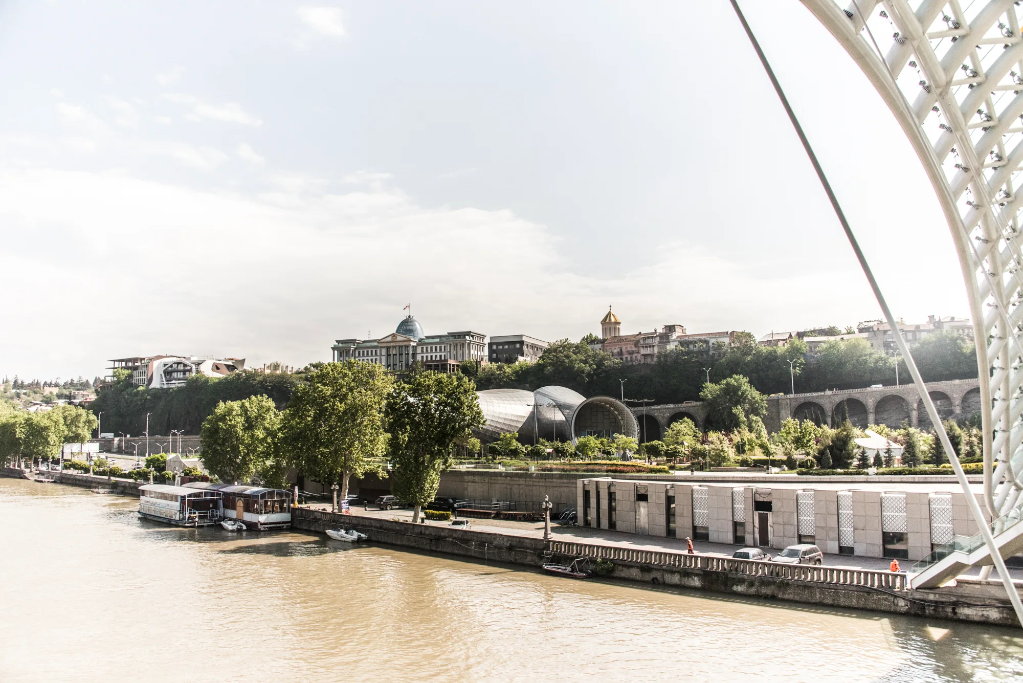 Kura river, Presidential Palace and Rike Park concert hall seen from the Bridge of Peace, Tbilisi, Georgia — Travel Notes, travel photography by Janina Laszlo