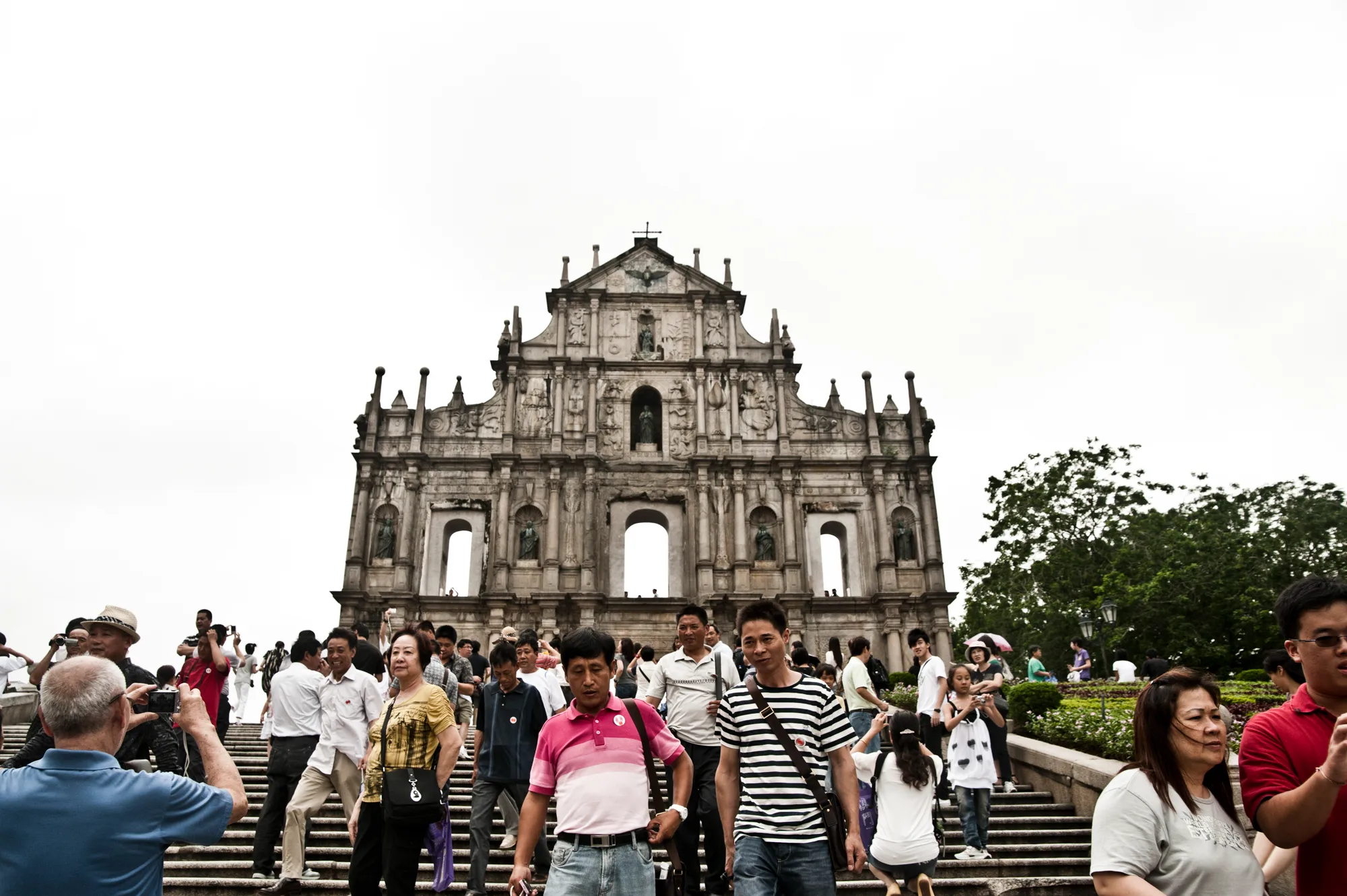 Crowds on the stone stairway below the baroque facade of the Ruins of St. Paul's, Macao — Travel Notes, travel photography by Janina Laszlo